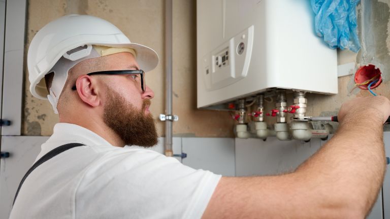 Gas boiler being serviced by Myza Gas in Swindon